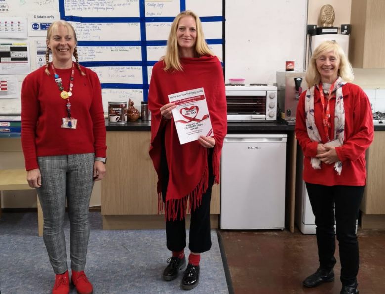 Staff wearing red for 'Red Card to Racism Day'
